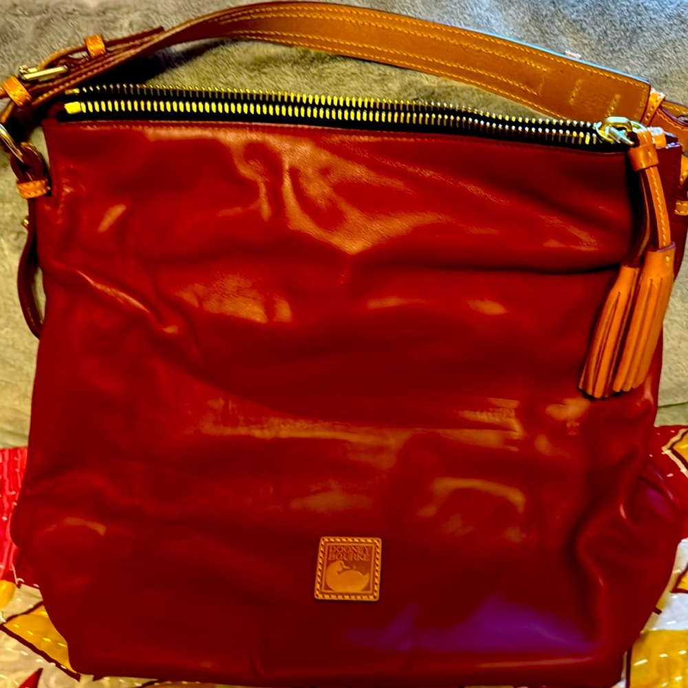 Dooney Burke bag.  Zip top, fold over. Excellent condition